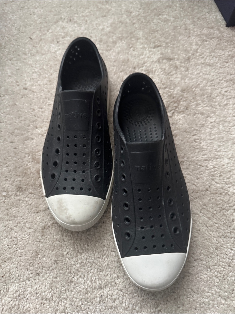 Native Black Slip-On Sneakers with White Toe Caps